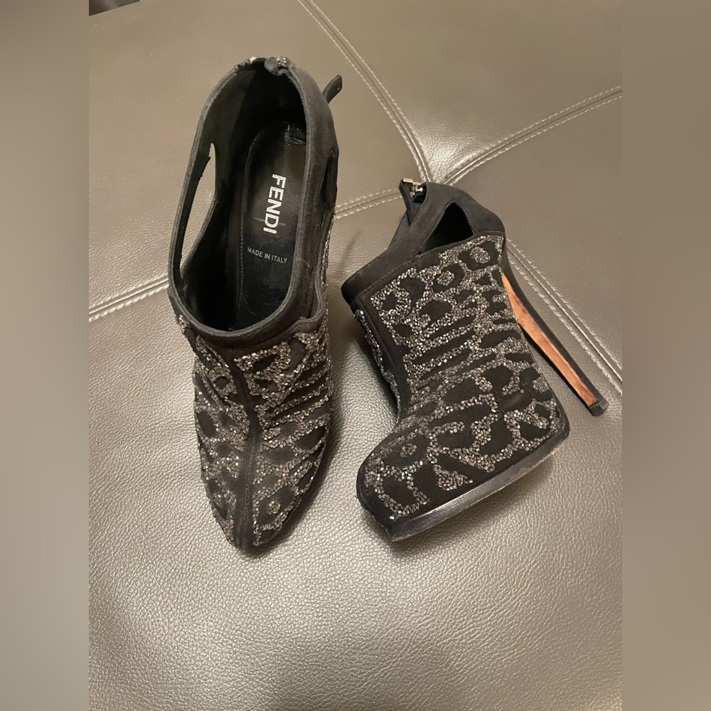 Very sexy black with silver bling heel.